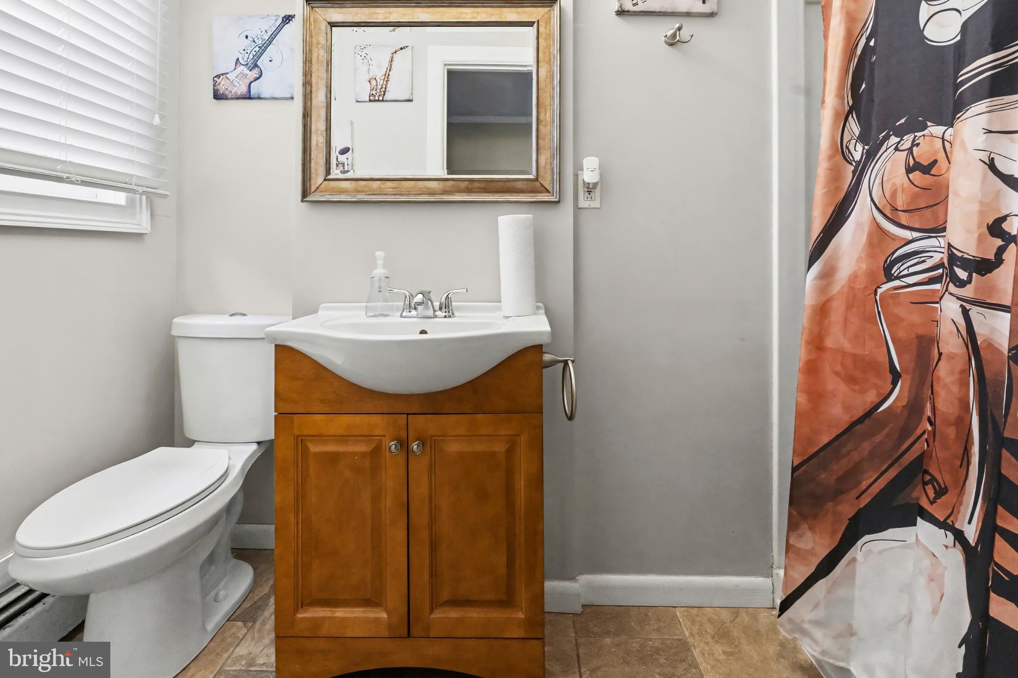 506 Norman Road York, PA 17406 - Photo 25 of 35 Charming bathroom with artistic flair.