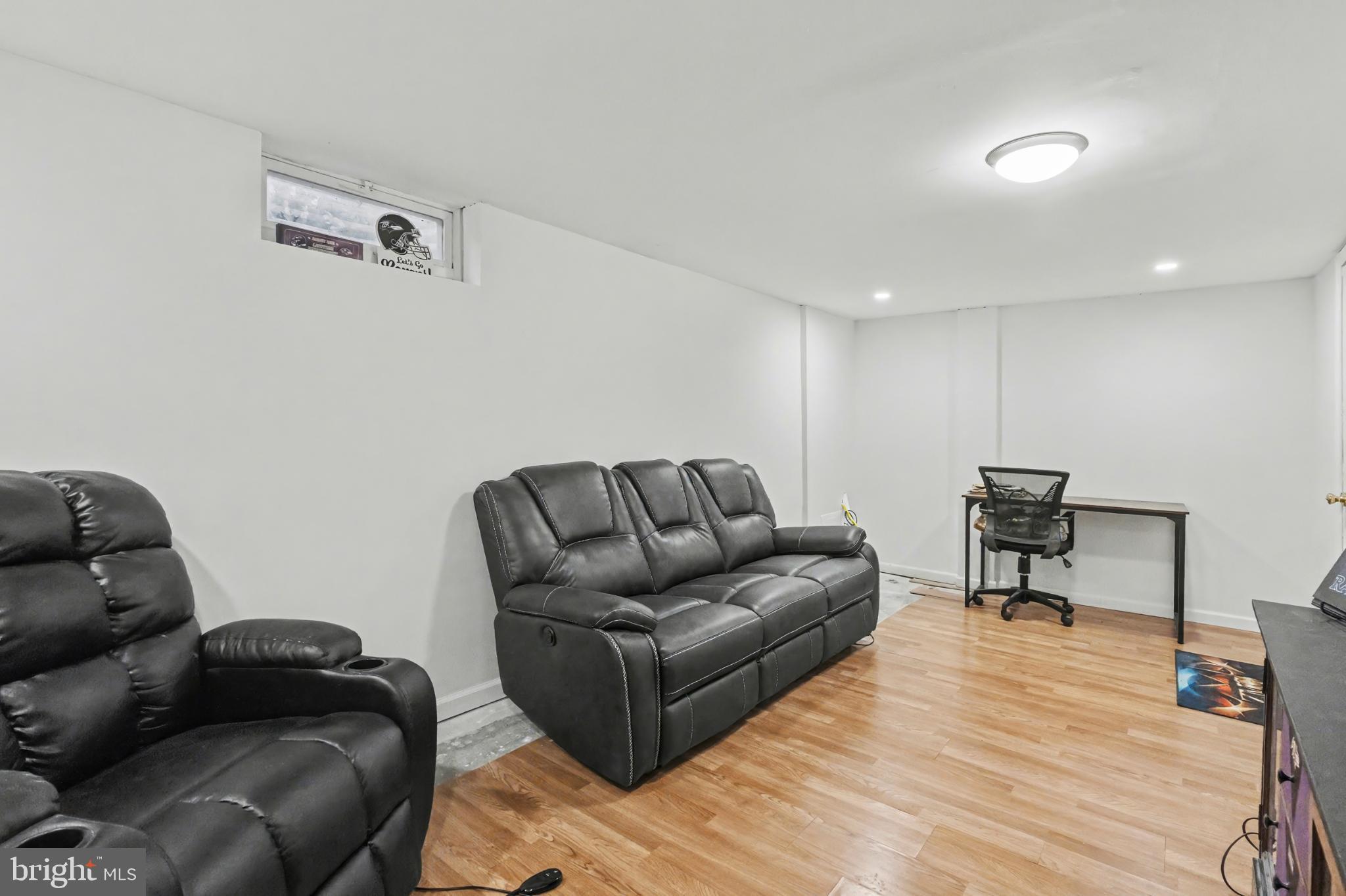 506 Norman Road York, PA 17406 - Photo 28 of 35 Cozy basement retreat with modern appeal.