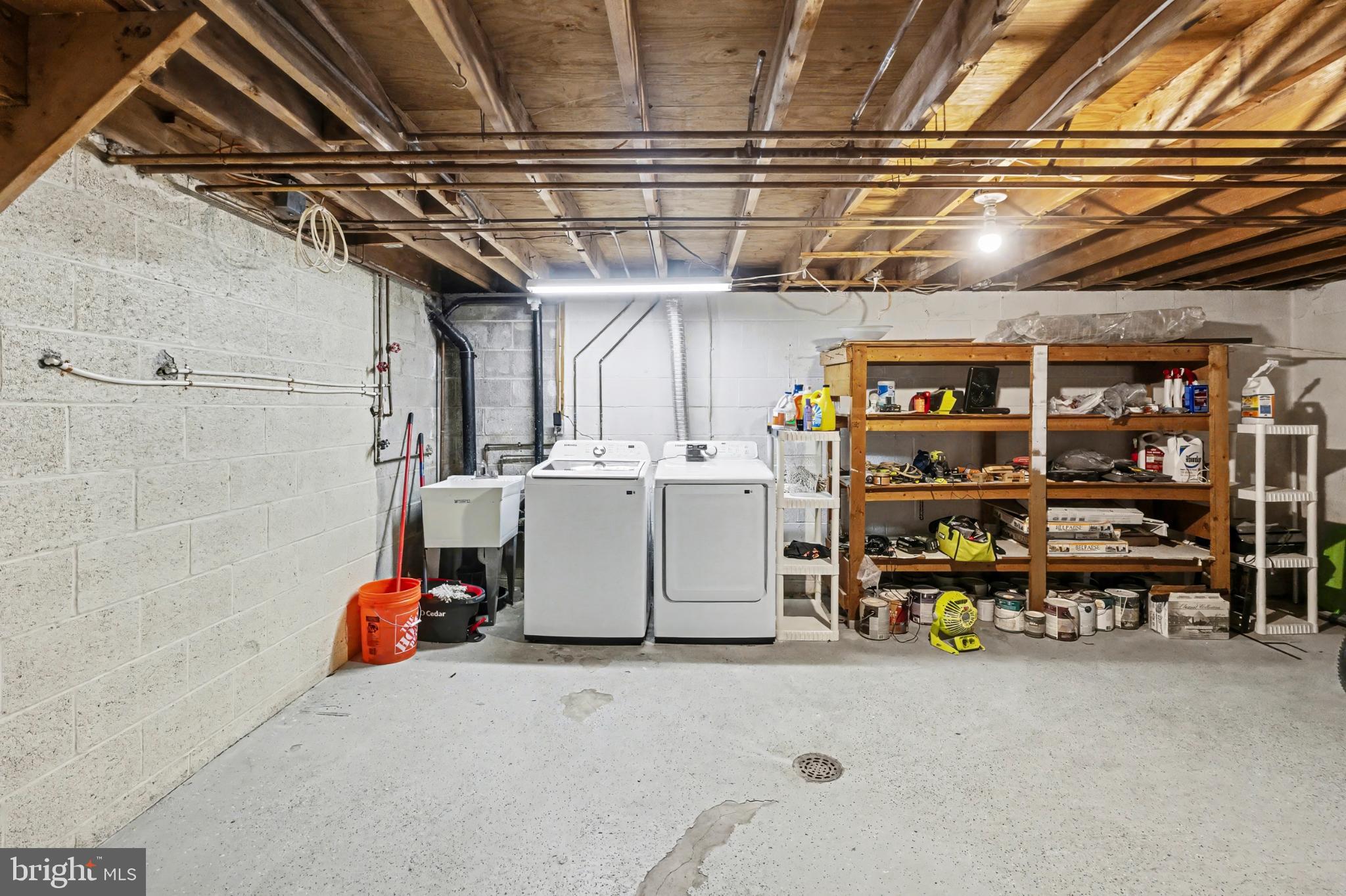506 Norman Road York, PA 17406 - Photo 30 of 35 Spacious basement laundry area with storage.