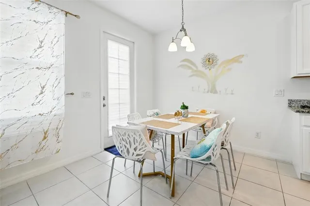 a kitchen with a sink cabinets and window