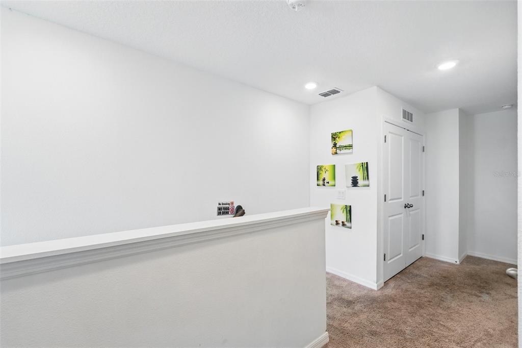 1421 Discovery Street Davenport, FL 33896 - Photo 22 of 44 a utility room with dryer and washer