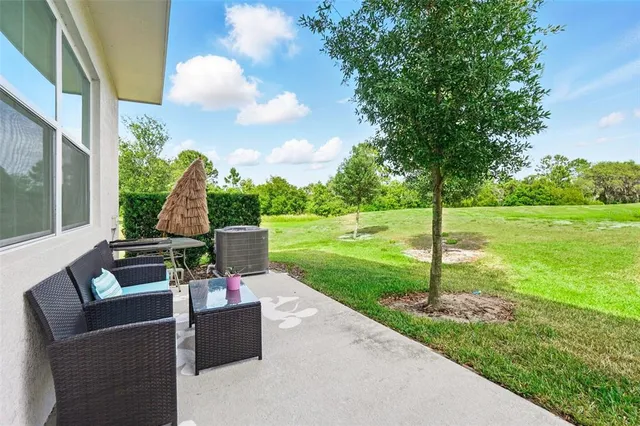 a building outdoor space with patio furniture