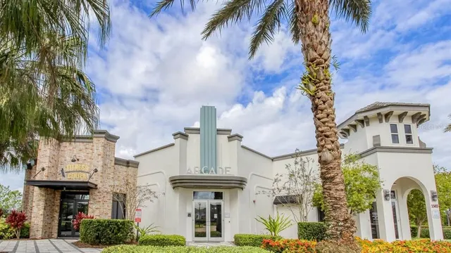an aerial view of a house with outdoor space