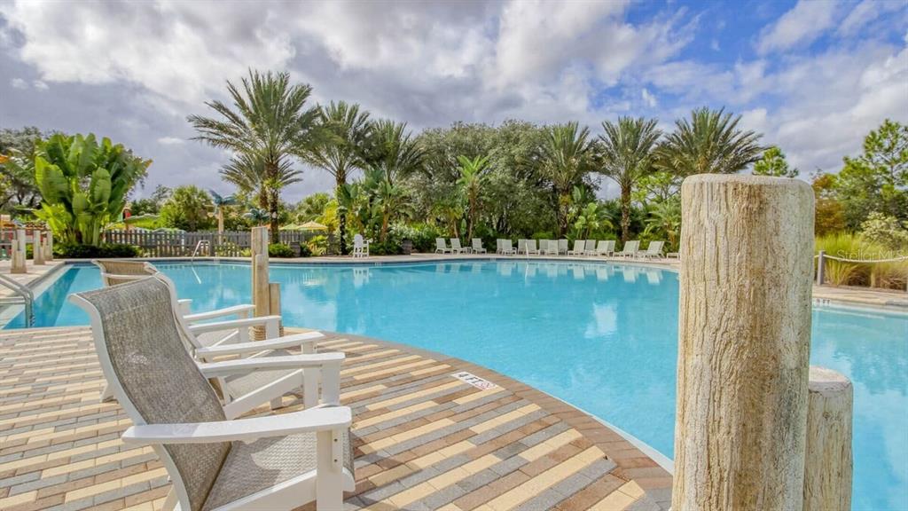 1421 Discovery Street Davenport, FL 33896 - Photo 40 of 44 a view of a swimming pool with a patio
