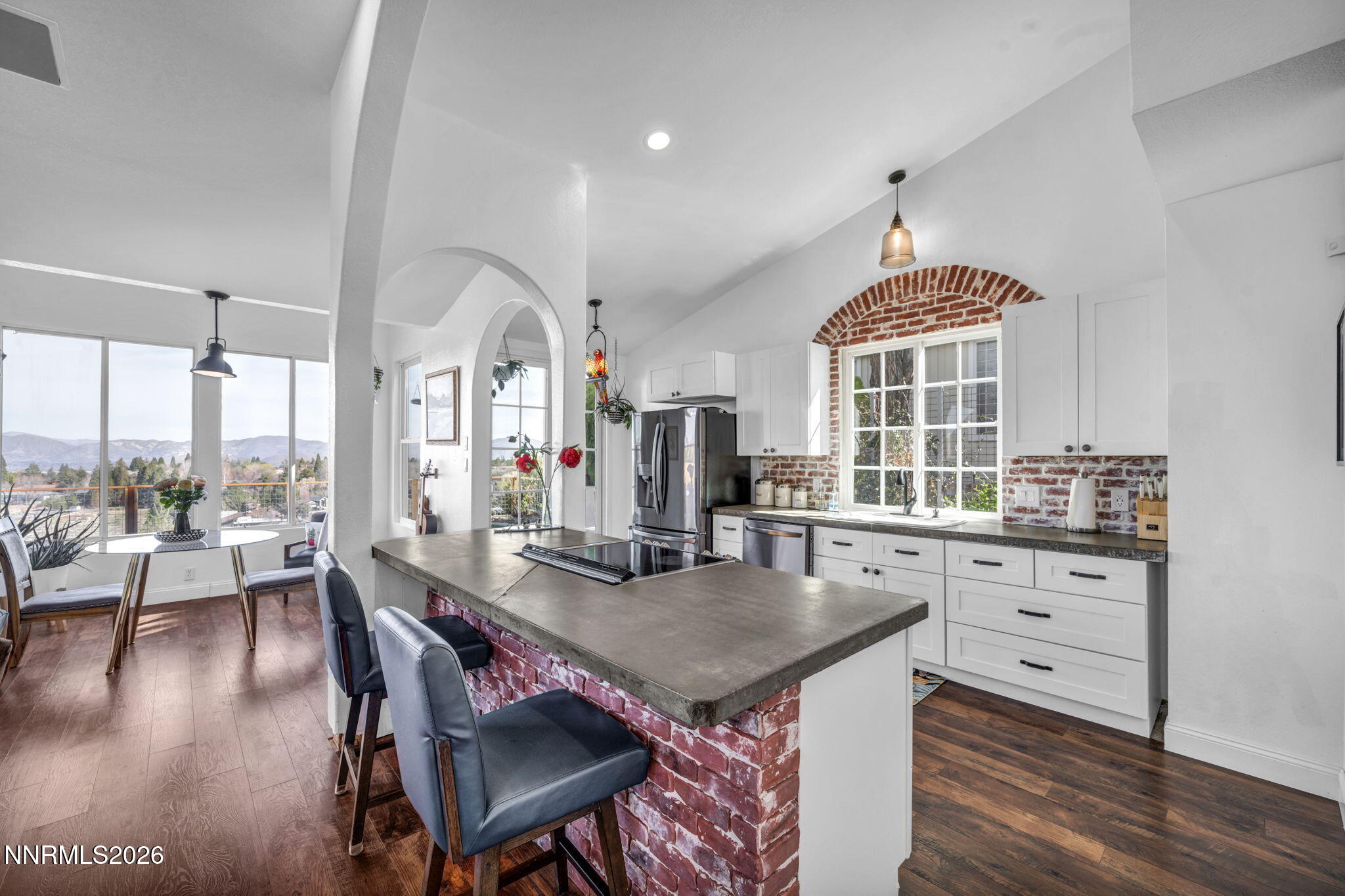 3332 Skyline View Drive Reno, NV 89509 - Photo 11 of 48 a view of a dining room with furniture window and wooden floor