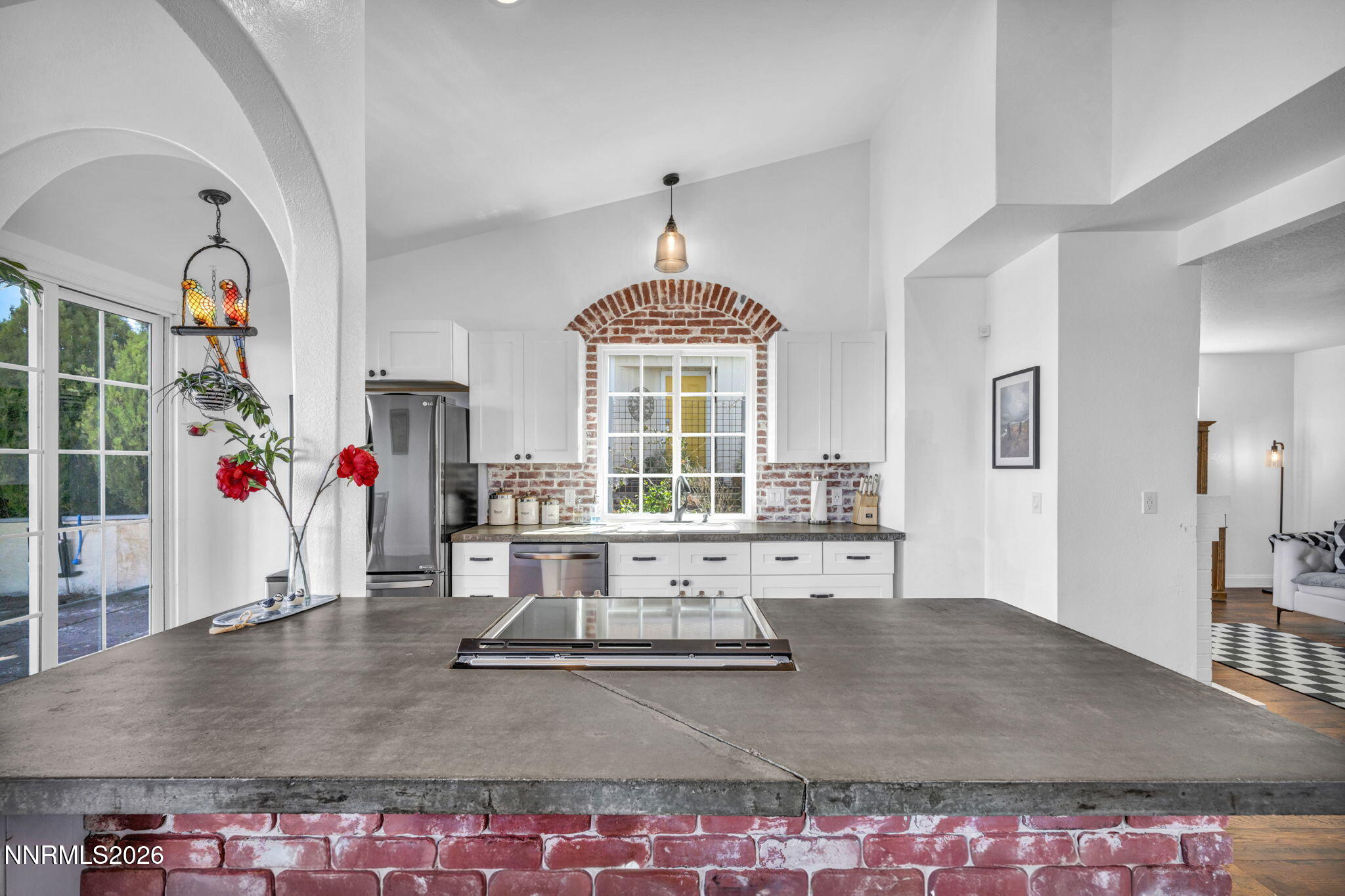 3332 Skyline View Drive Reno, NV 89509 - Photo 12 of 48 a living room with furniture and a chandelier
