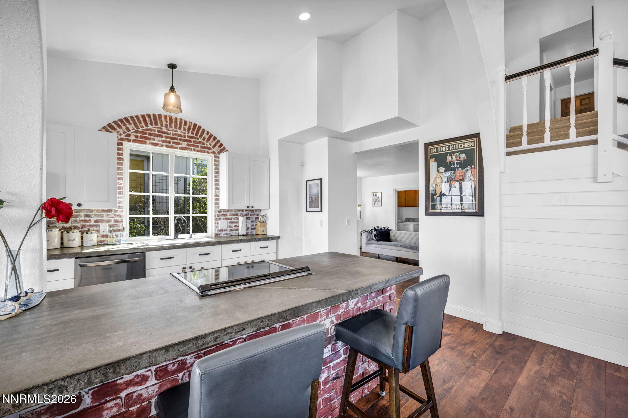 3332 Skyline View Drive Reno, NV 89509 - Photo 13 of 48 a kitchen with a dining table chairs and stove