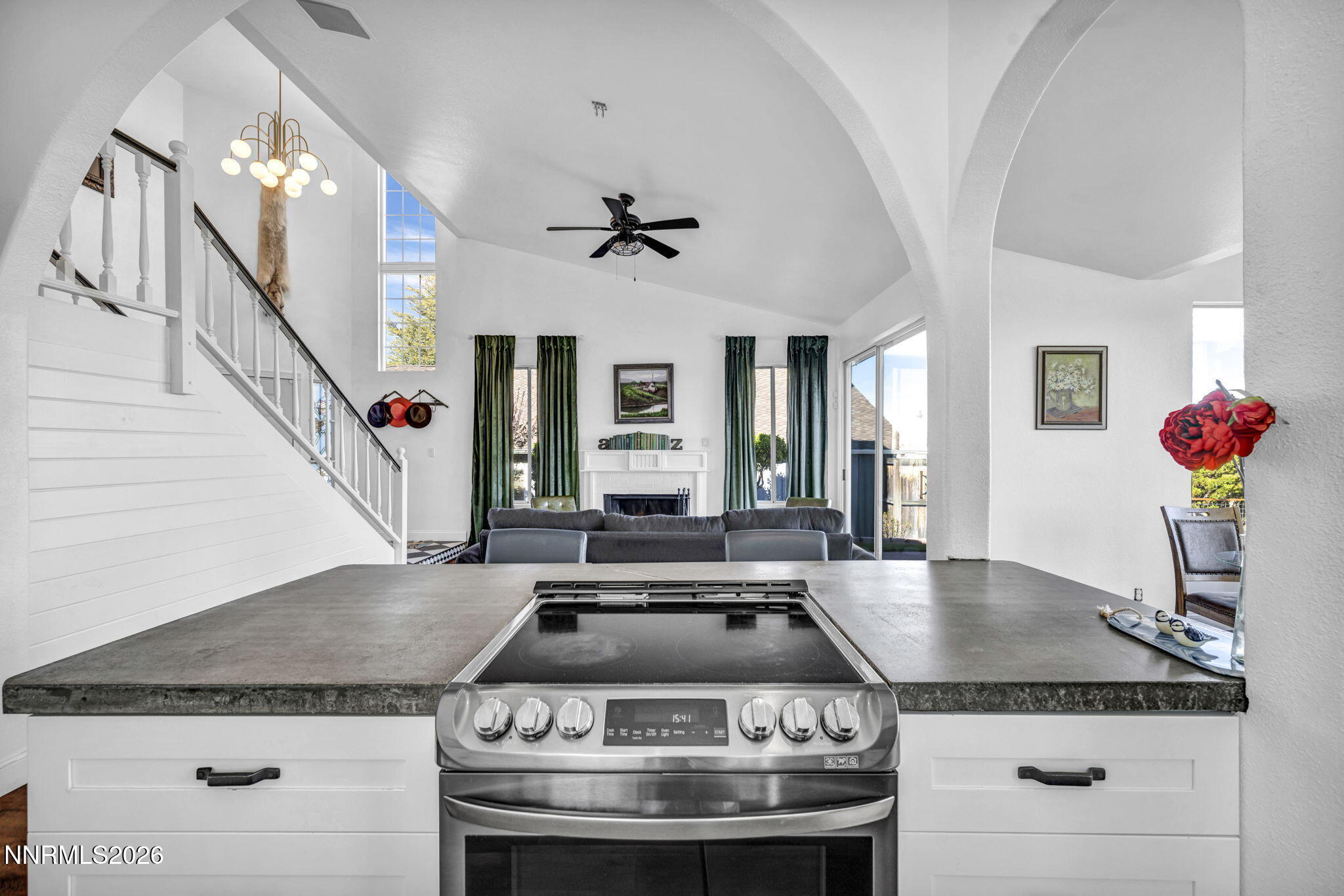 3332 Skyline View Drive Reno, NV 89509 - Photo 17 of 48 a view of a kitchen with a stove and a chandelier
