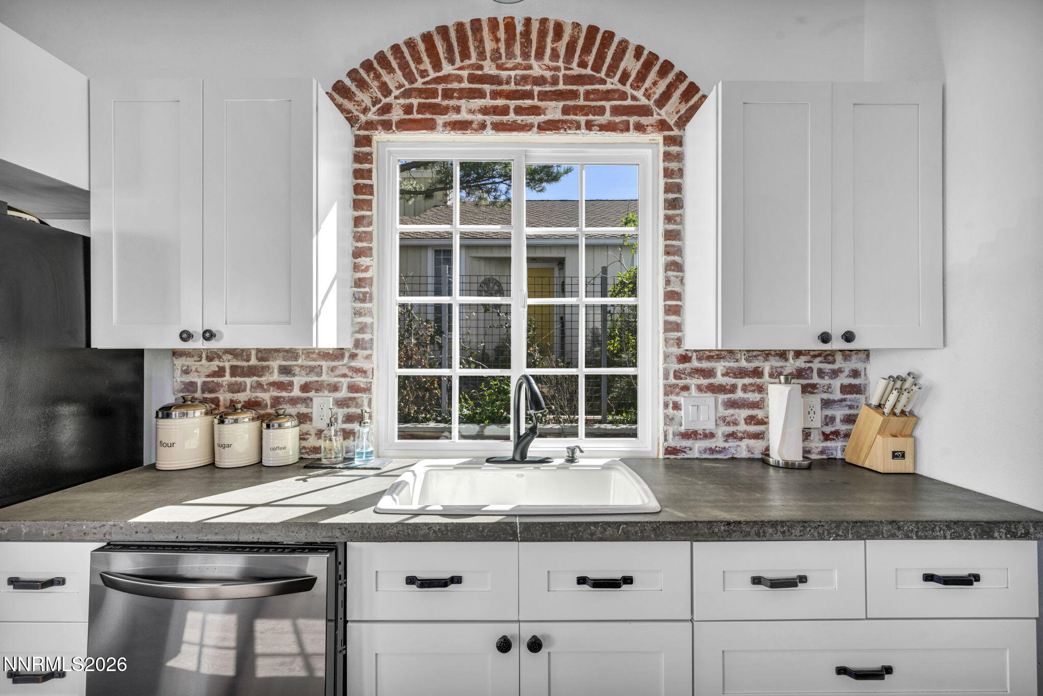3332 Skyline View Drive Reno, NV 89509 - Photo 20 of 48 a kitchen with granite countertop a sink and a stove