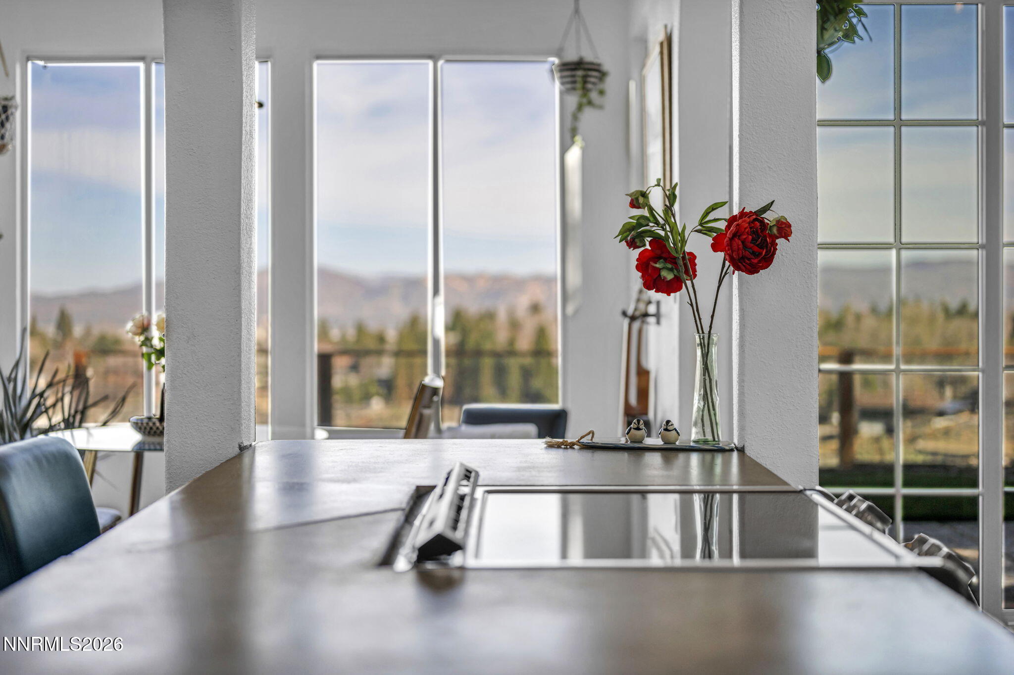 3332 Skyline View Drive Reno, NV 89509 - Photo 21 of 48 a view of a living room with a floor to ceiling window and wooden floor
