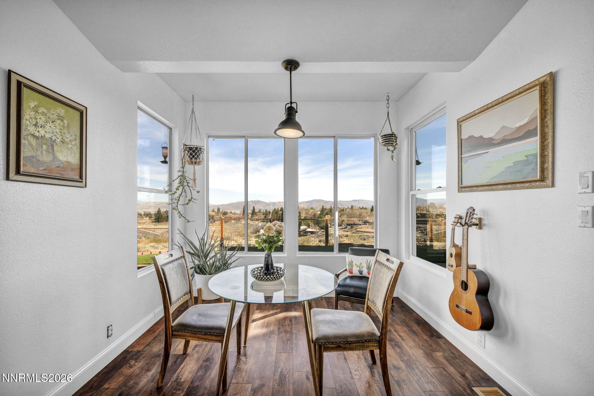 3332 Skyline View Drive Reno, NV 89509 - Photo 24 of 48 a dining room with furniture a chandelier and window