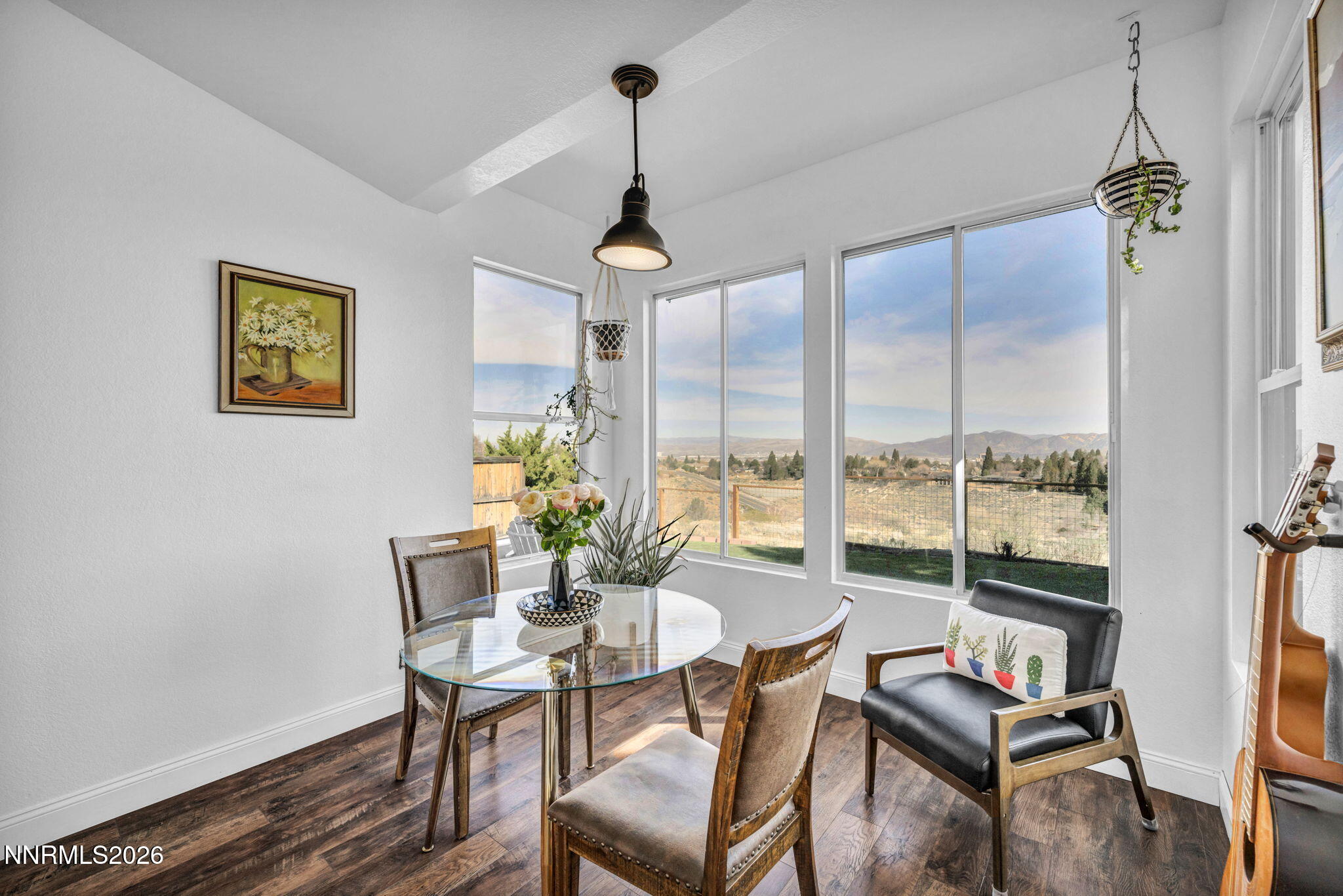 3332 Skyline View Drive Reno, NV 89509 - Photo 25 of 48 a dining room with furniture a chandelier and wooden floor