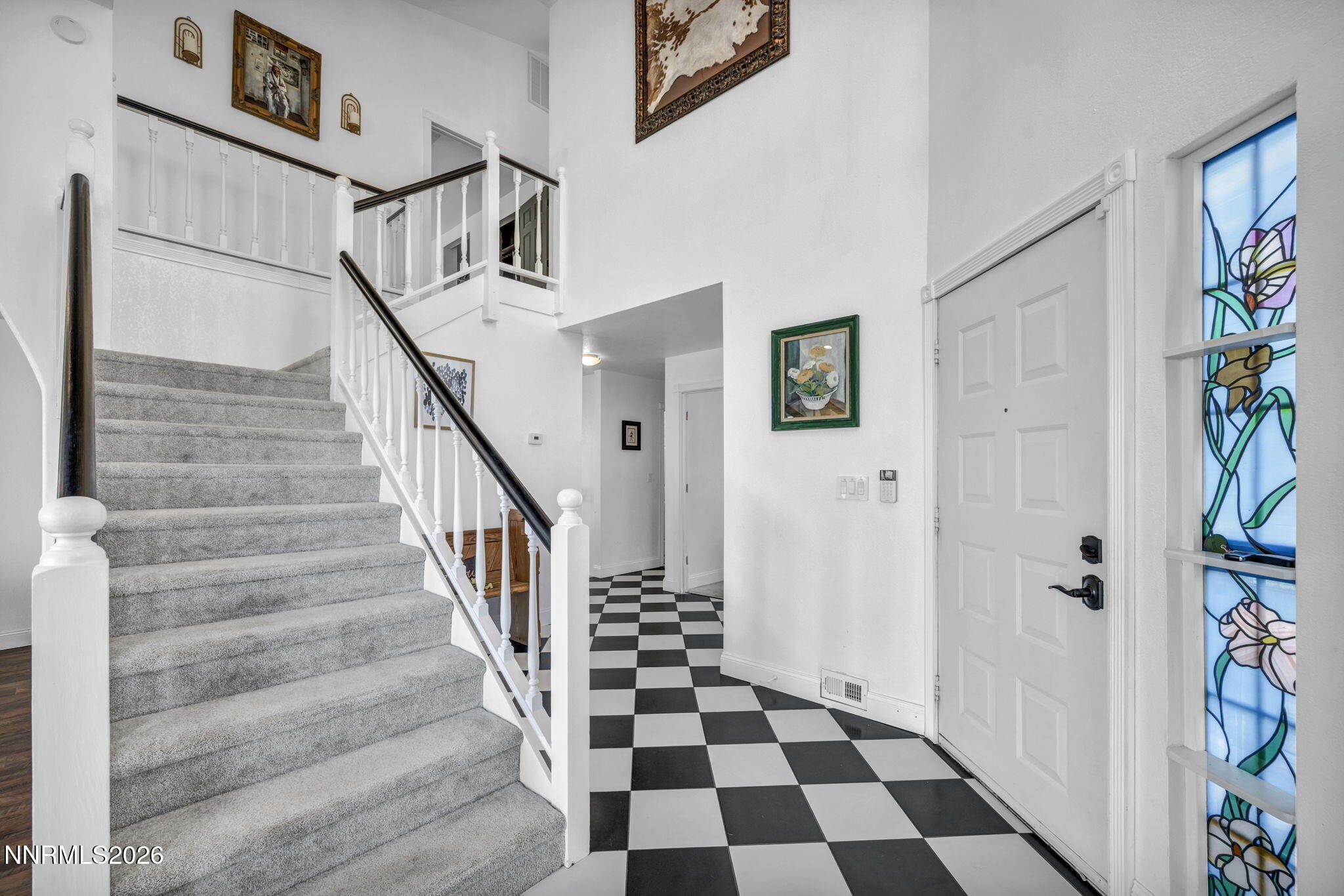 3332 Skyline View Drive Reno, NV 89509 - Photo 30 of 48 a view of a hallway with front door and stairs