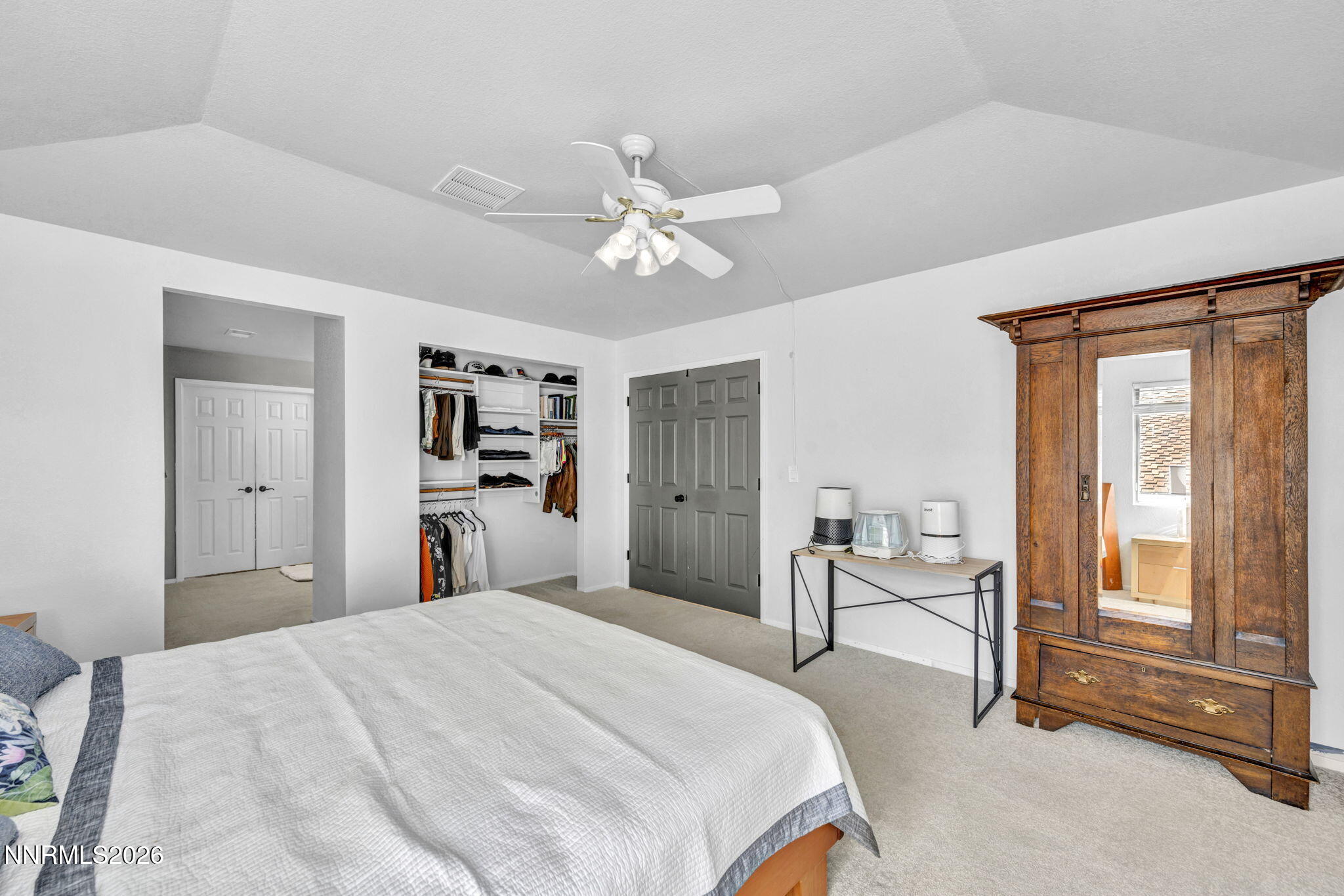 3332 Skyline View Drive Reno, NV 89509 - Photo 35 of 48 a bedroom with a bed and a chandelier