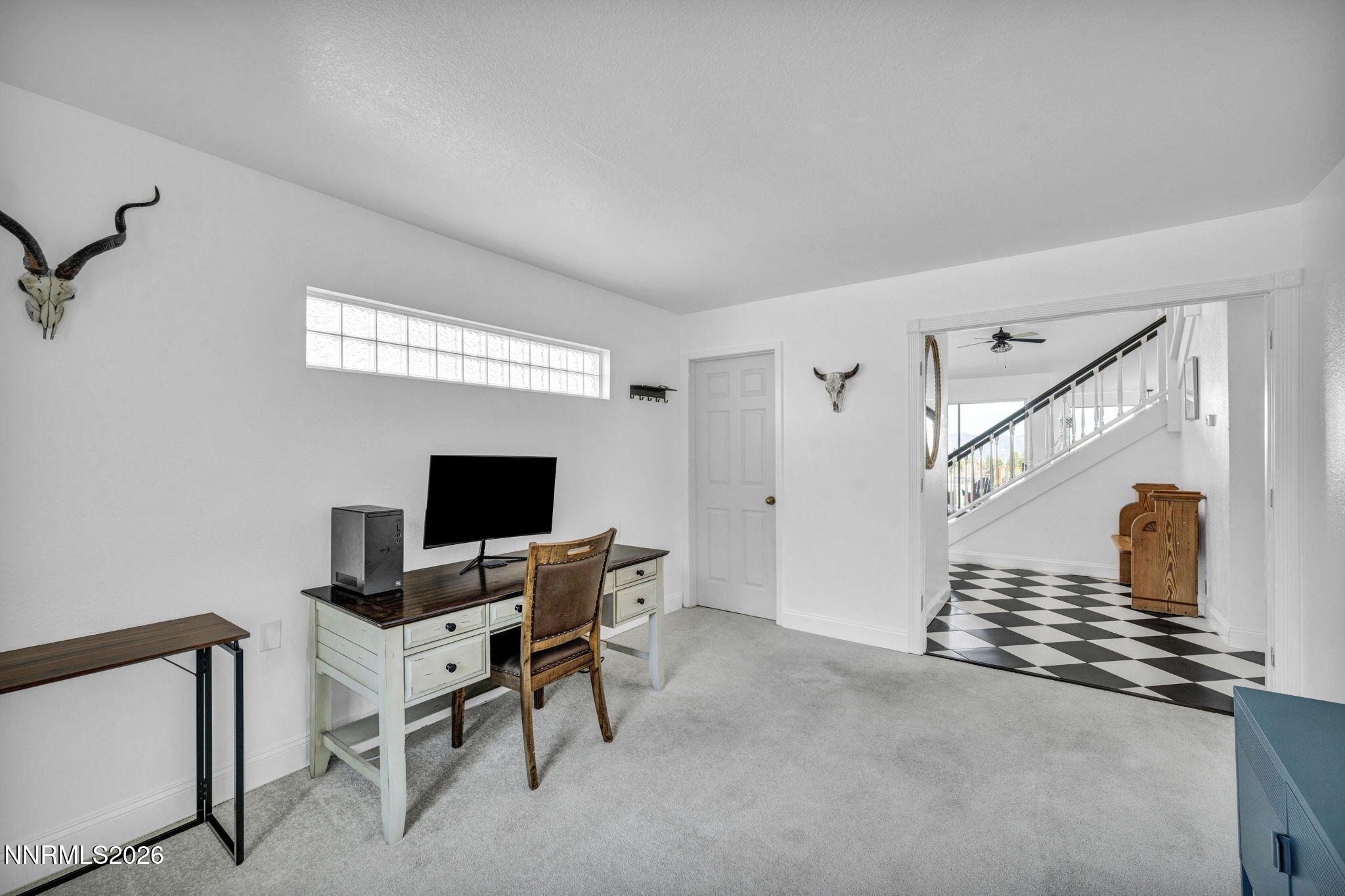 3332 Skyline View Drive Reno, NV 89509 - Photo 38 of 48 a view of a workspace with furniture and a window