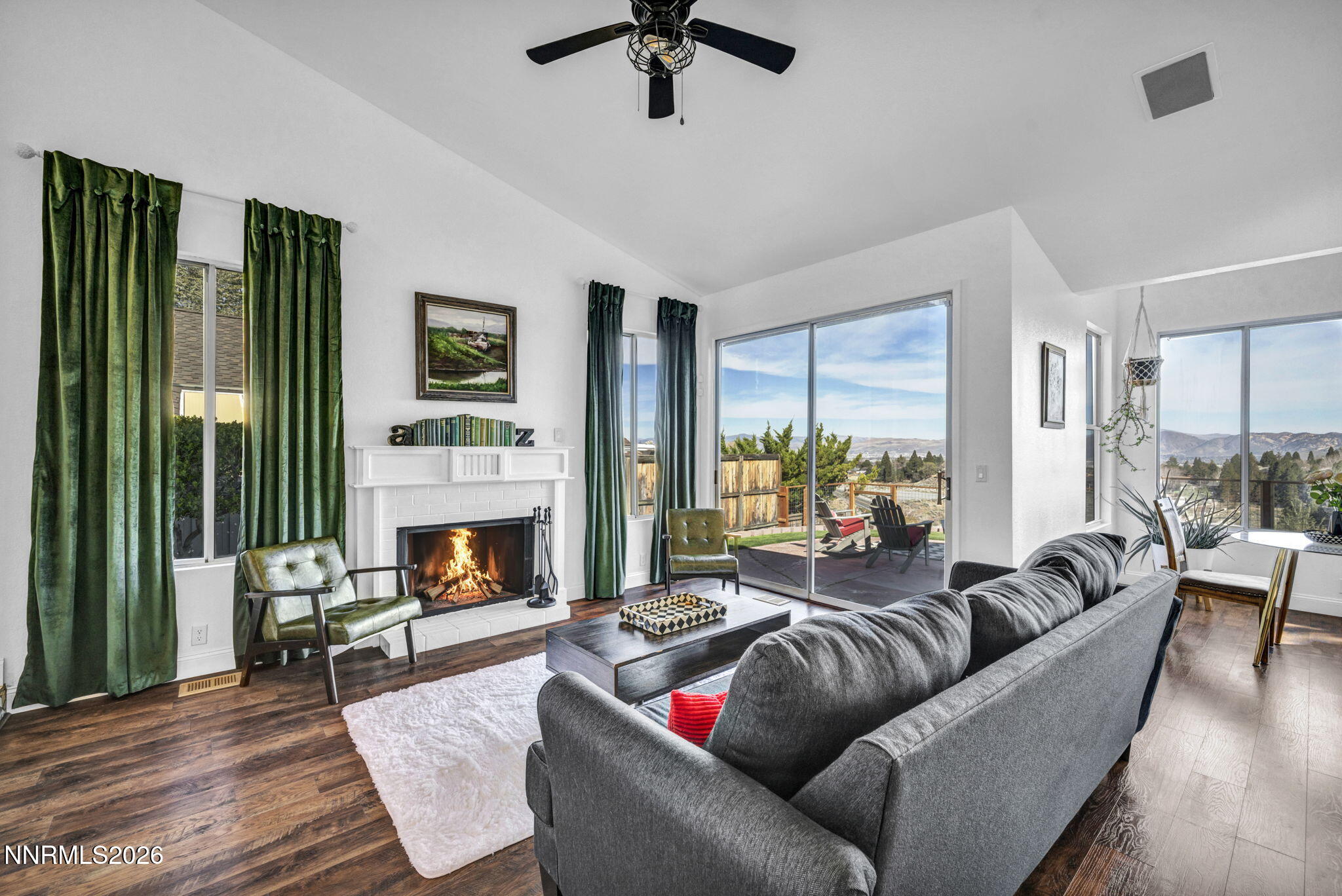3332 Skyline View Drive Reno, NV 89509 - Photo 4 of 48 a living room with furniture fireplace and a large window