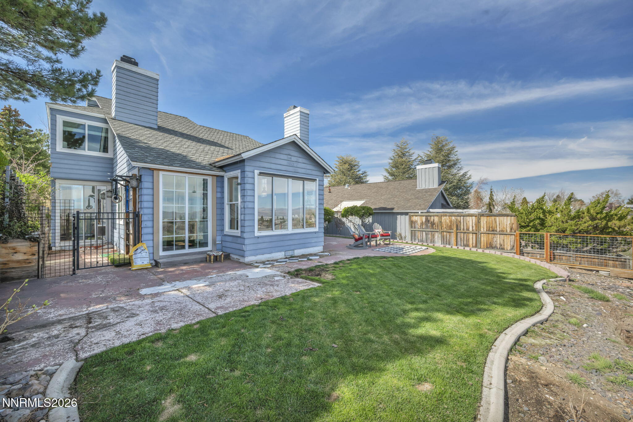 3332 Skyline View Drive Reno, NV 89509 - Photo 43 of 48 a front view of a house with a garden