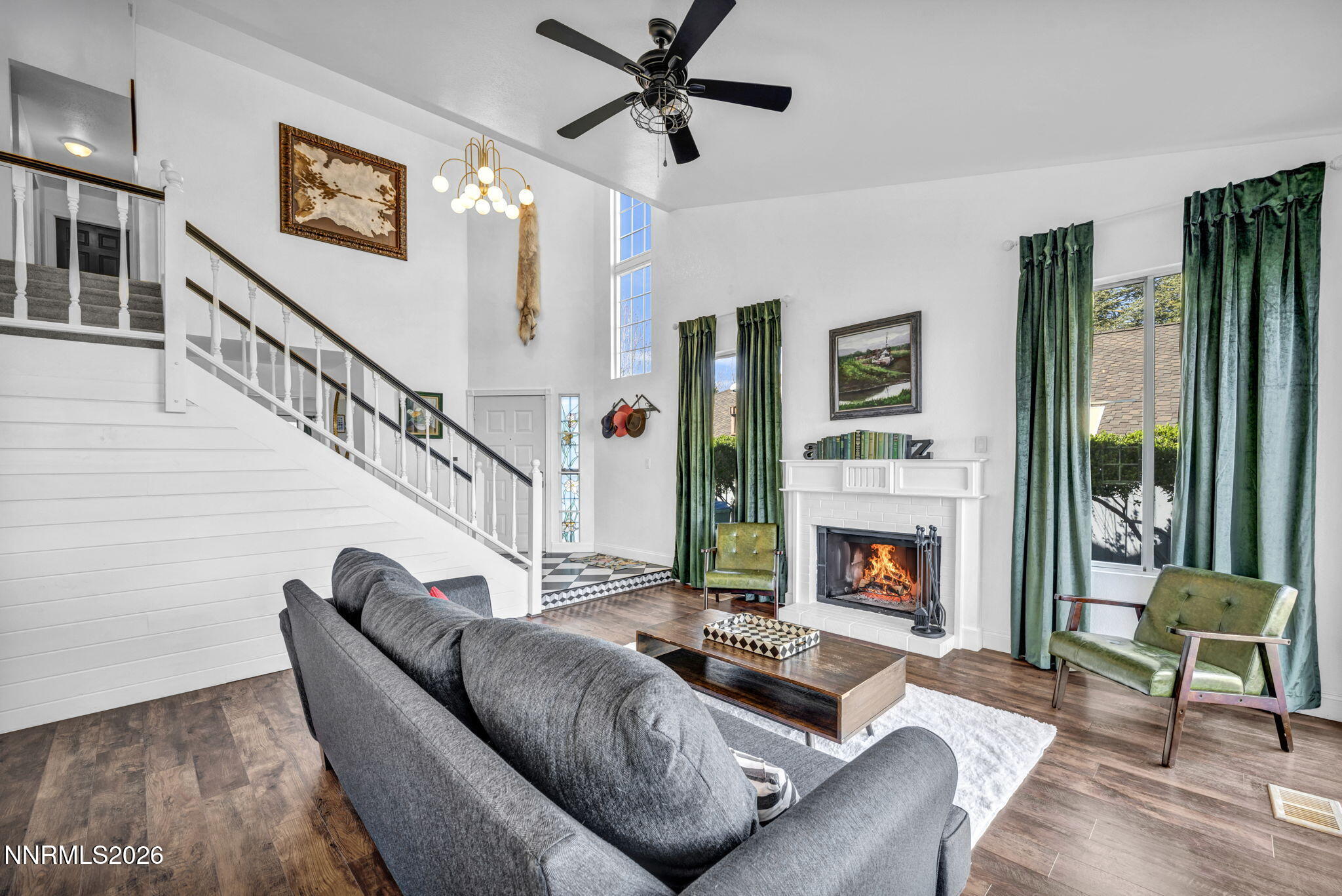 3332 Skyline View Drive Reno, NV 89509 - Photo 10 of 48 a living room with furniture fireplace and a large window