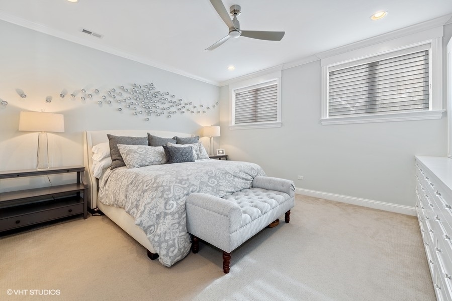 1248 West Grace Street, Unit 1 Chicago, IL 60613 - Photo 19 of 35 a bedroom with a bed and a window