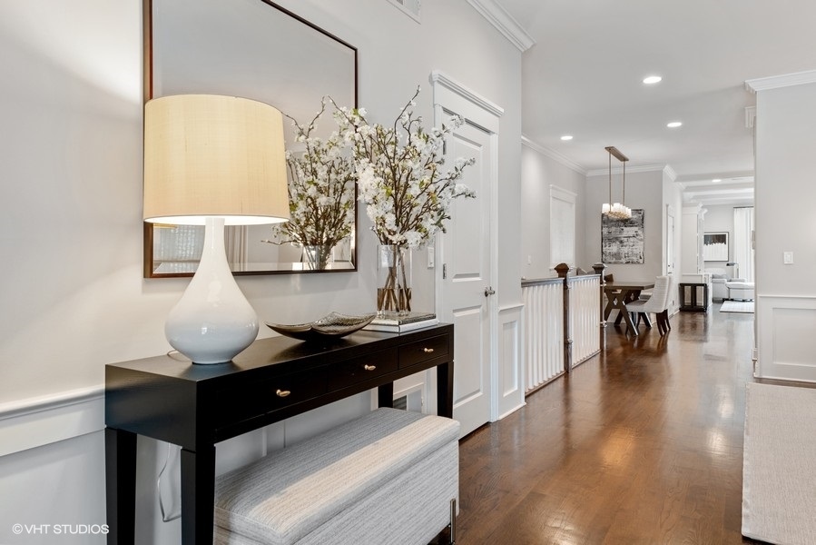 1248 West Grace Street, Unit 1 Chicago, IL 60613 - Photo 2 of 35 a living room with furniture and wooden floor