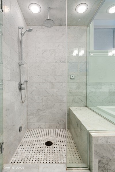 1248 West Grace Street, Unit 1 Chicago, IL 60613 - Photo 24 of 35 a bathroom with a shower and a toilet