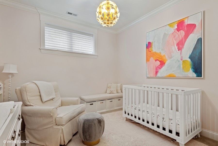 1248 West Grace Street, Unit 1 Chicago, IL 60613 - Photo 29 of 35 a bedroom with furniture and a window