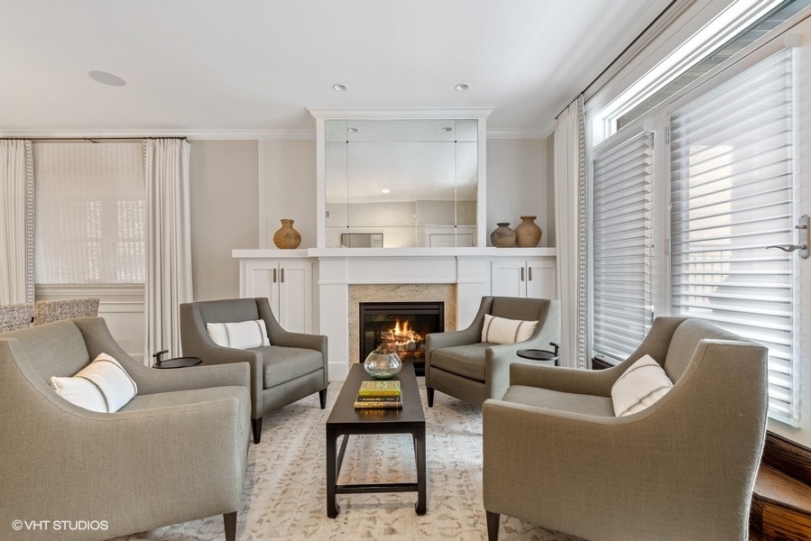1248 West Grace Street, Unit 1 Chicago, IL 60613 - Photo 5 of 35 a living room with furniture and a fireplace