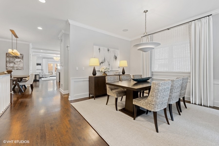 1248 West Grace Street, Unit 1 Chicago, IL 60613 - Photo 8 of 35 a view of a dining room with furniture