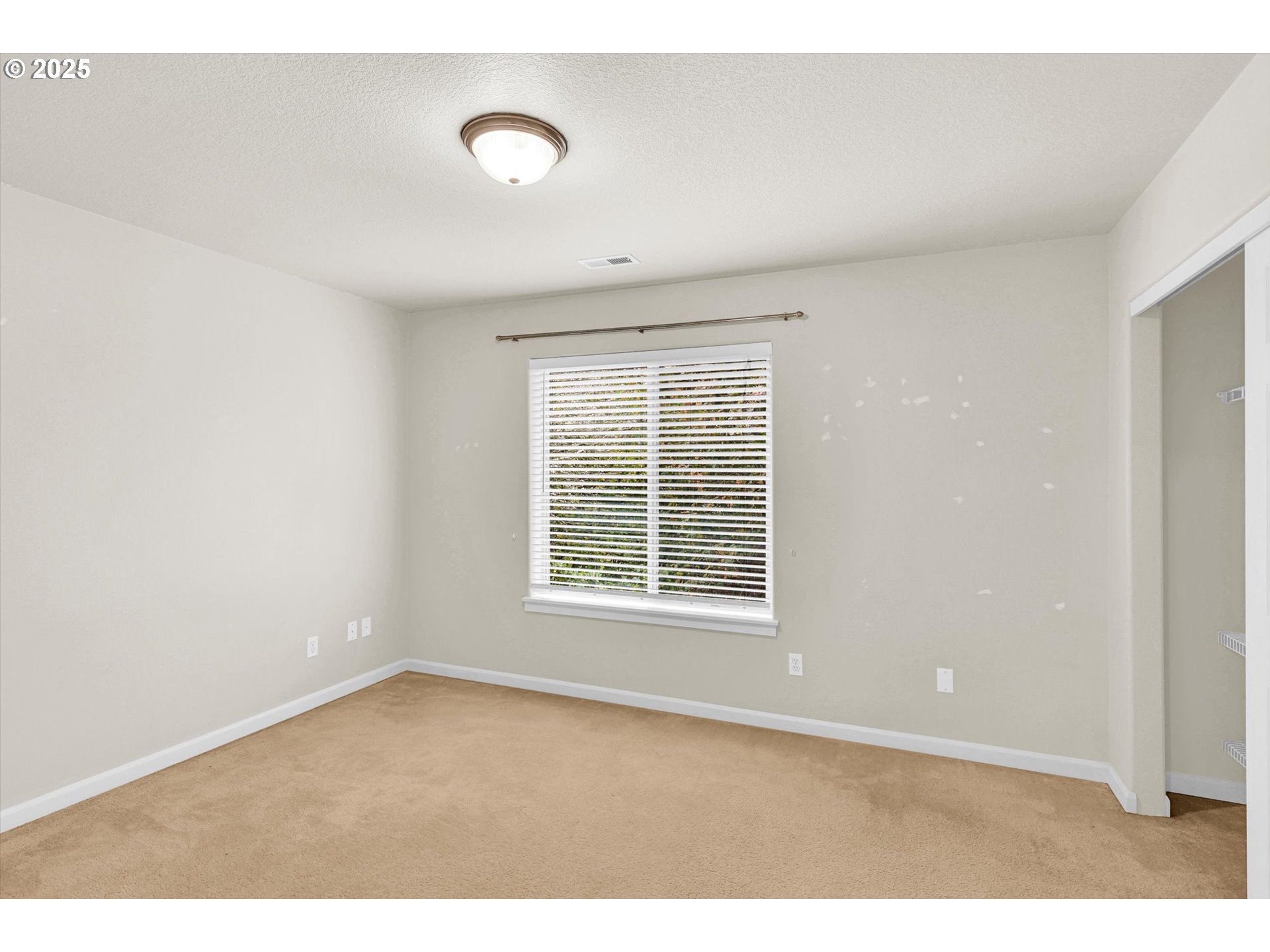 1892 Southwest Willowview Terrace Beaverton, OR 97003 - Photo 27 of 48 a view of an empty room with a window