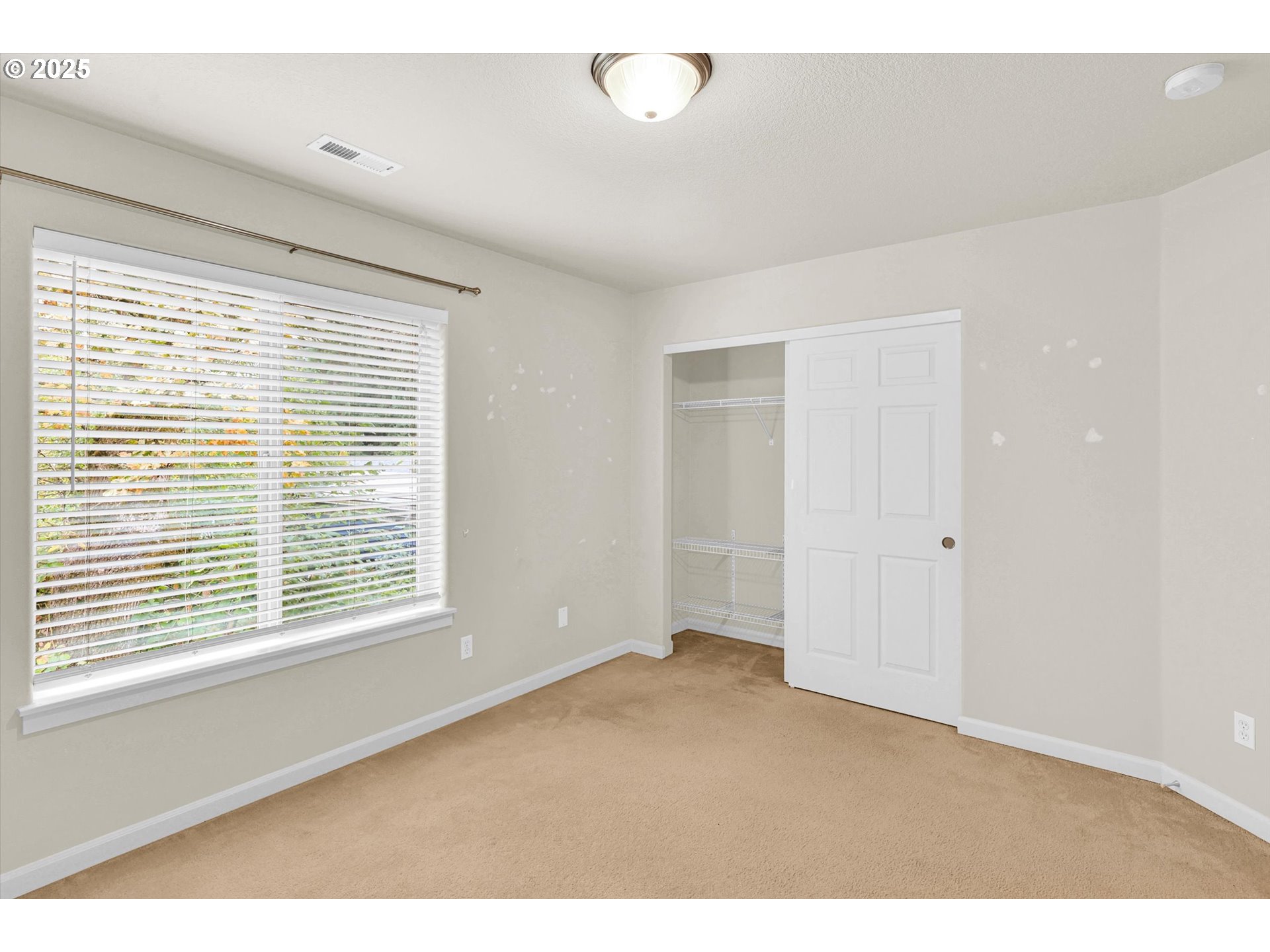 1892 Southwest Willowview Terrace Beaverton, OR 97003 - Photo 28 of 48 a view of an empty room with a window