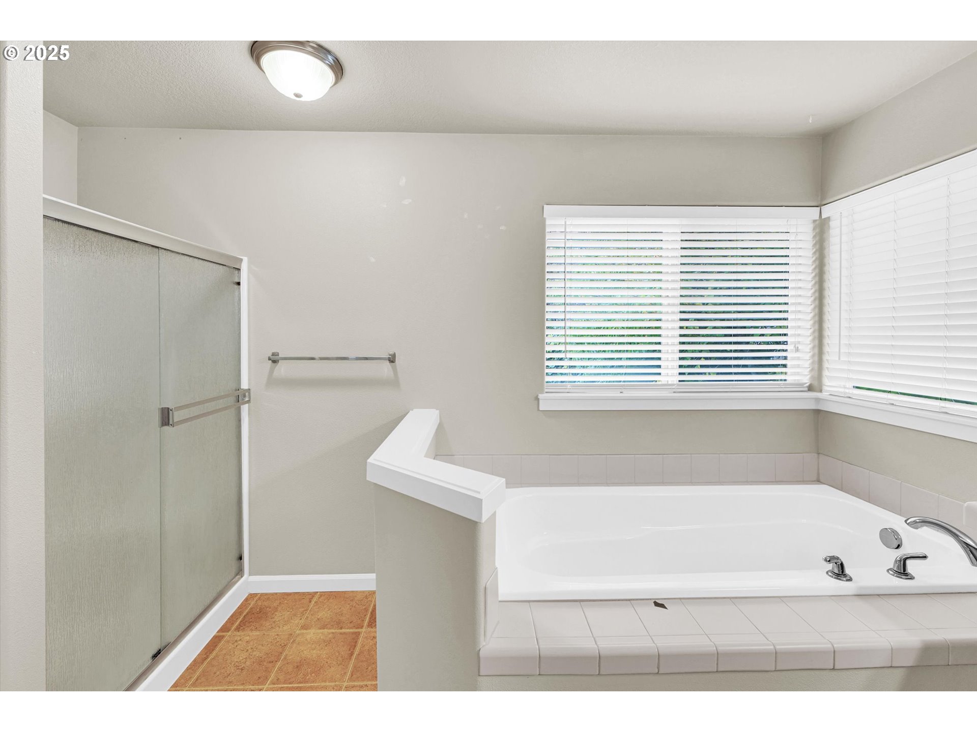 1892 Southwest Willowview Terrace Beaverton, OR 97003 - Photo 34 of 48 a bathroom with a bathtub and a shower