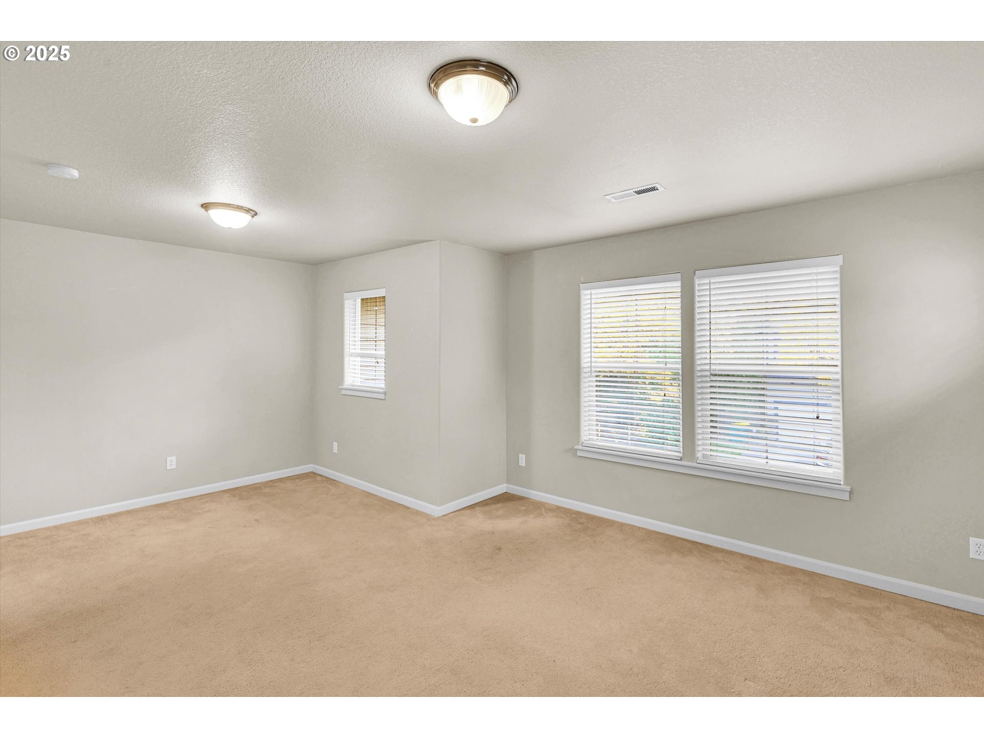 1892 Southwest Willowview Terrace Beaverton, OR 97003 - Photo 44 of 48 a view of an empty room with a window