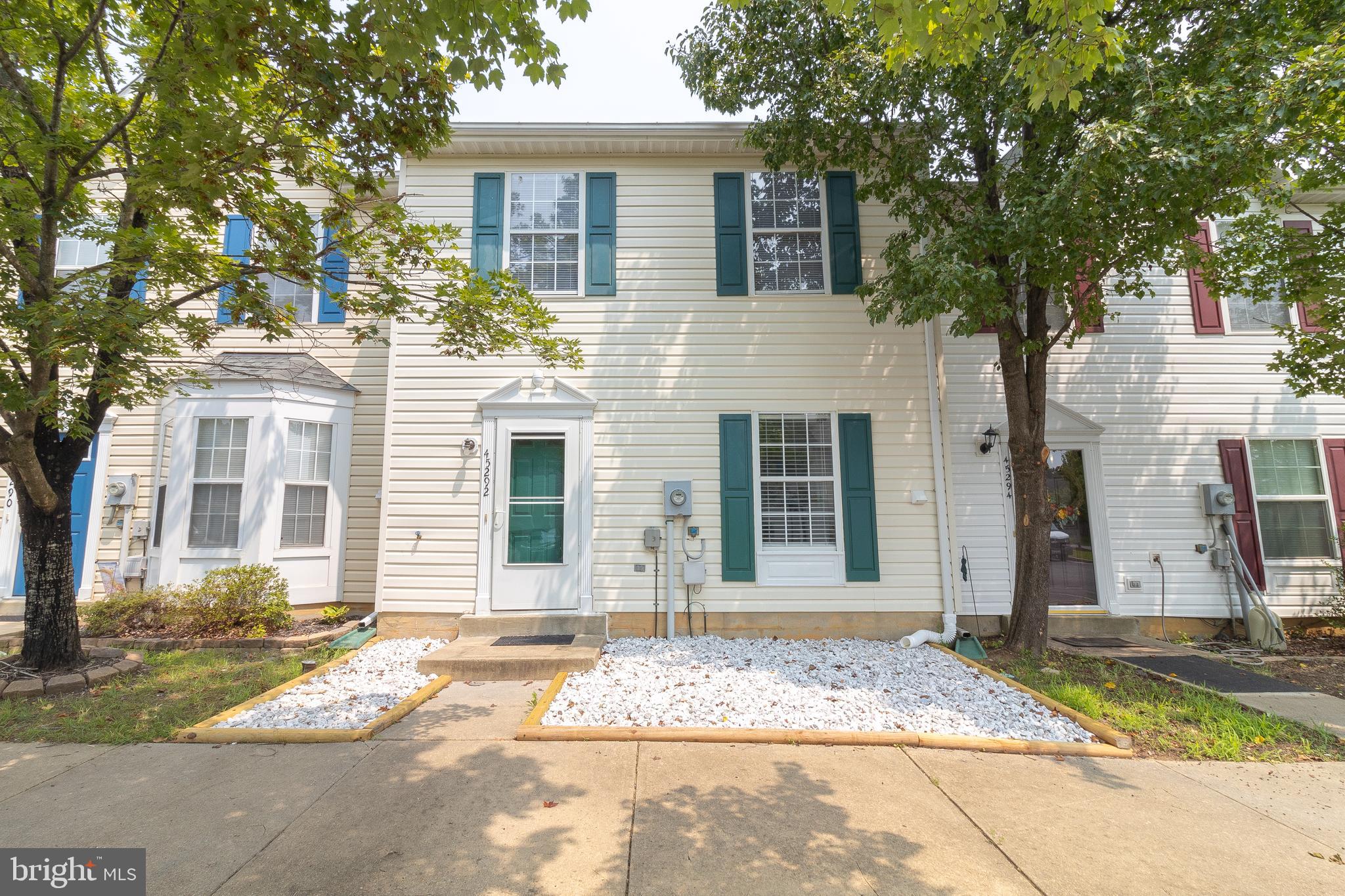 45292 Rumsford Lane California, MD 20619 - Photo 1 of 18 a front view of a house