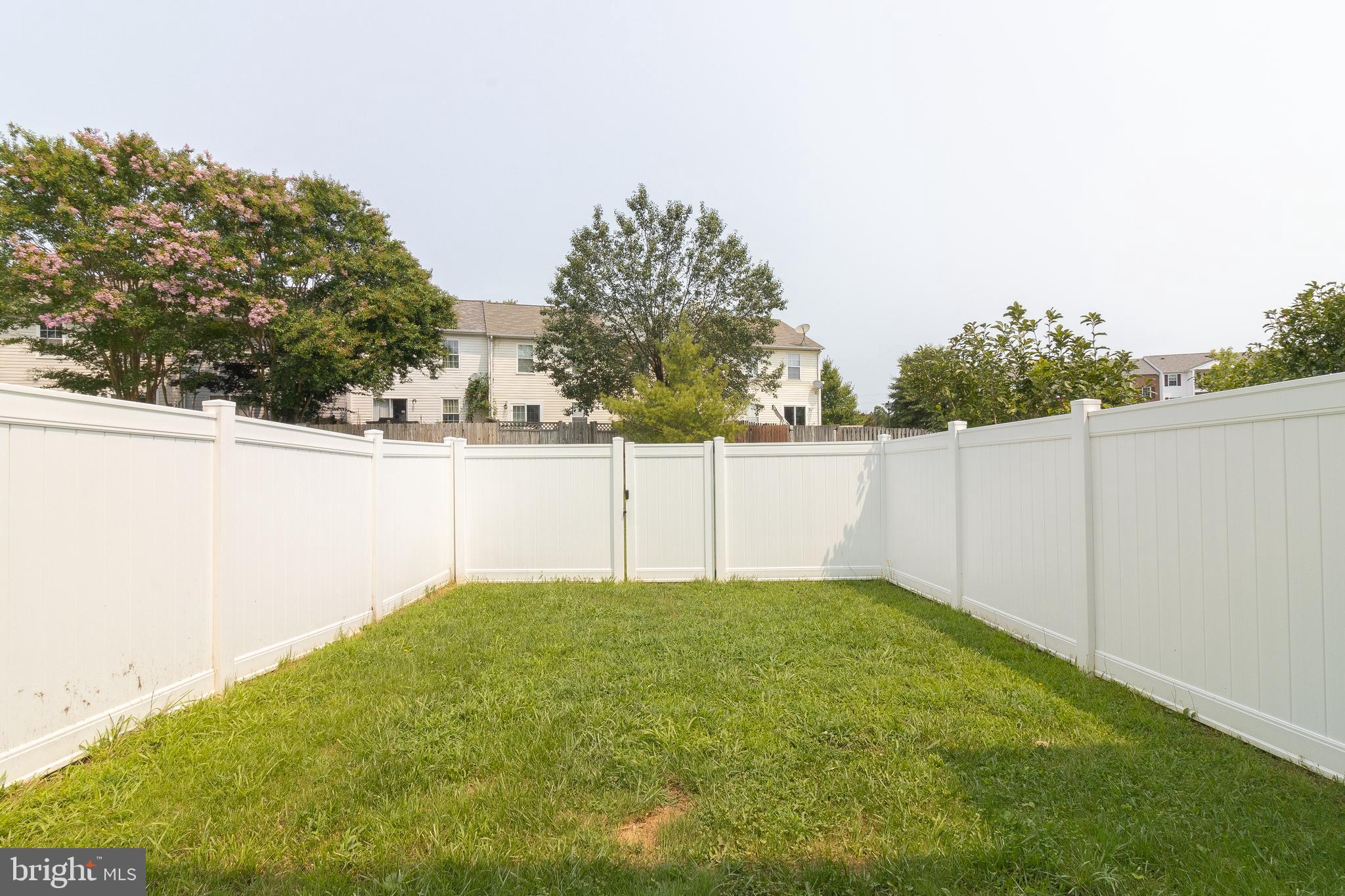 45292 Rumsford Lane California, MD 20619 - Photo 17 of 18 a view of a backyard