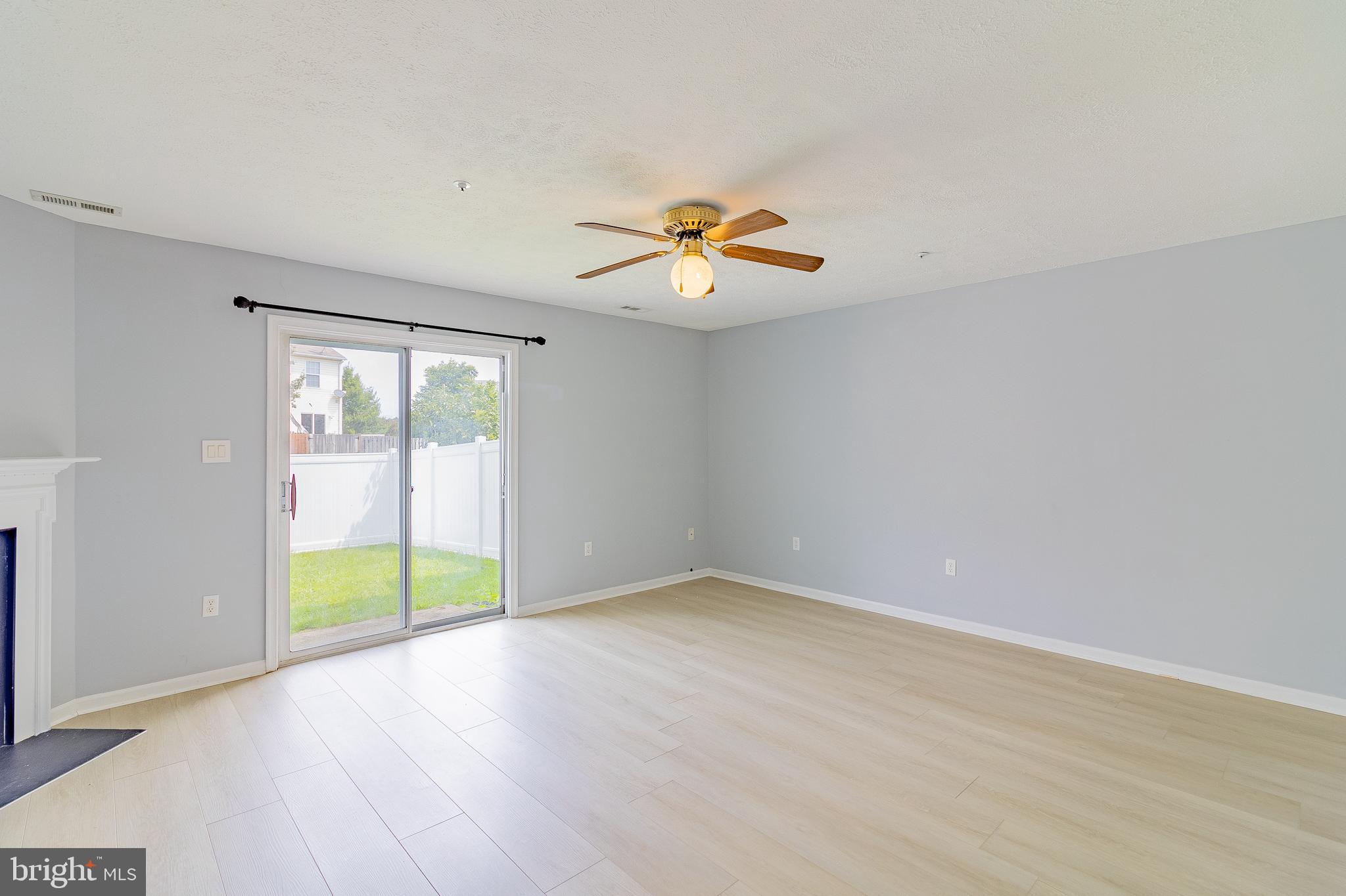 45292 Rumsford Lane California, MD 20619 - Photo 5 of 18 wooden floor in an empty room with a window