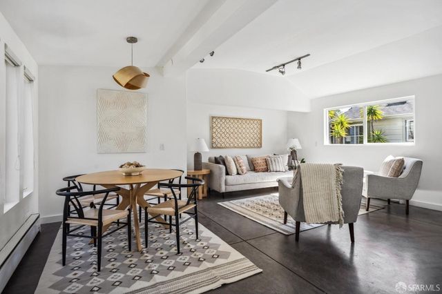 a view of a livingroom and dining room