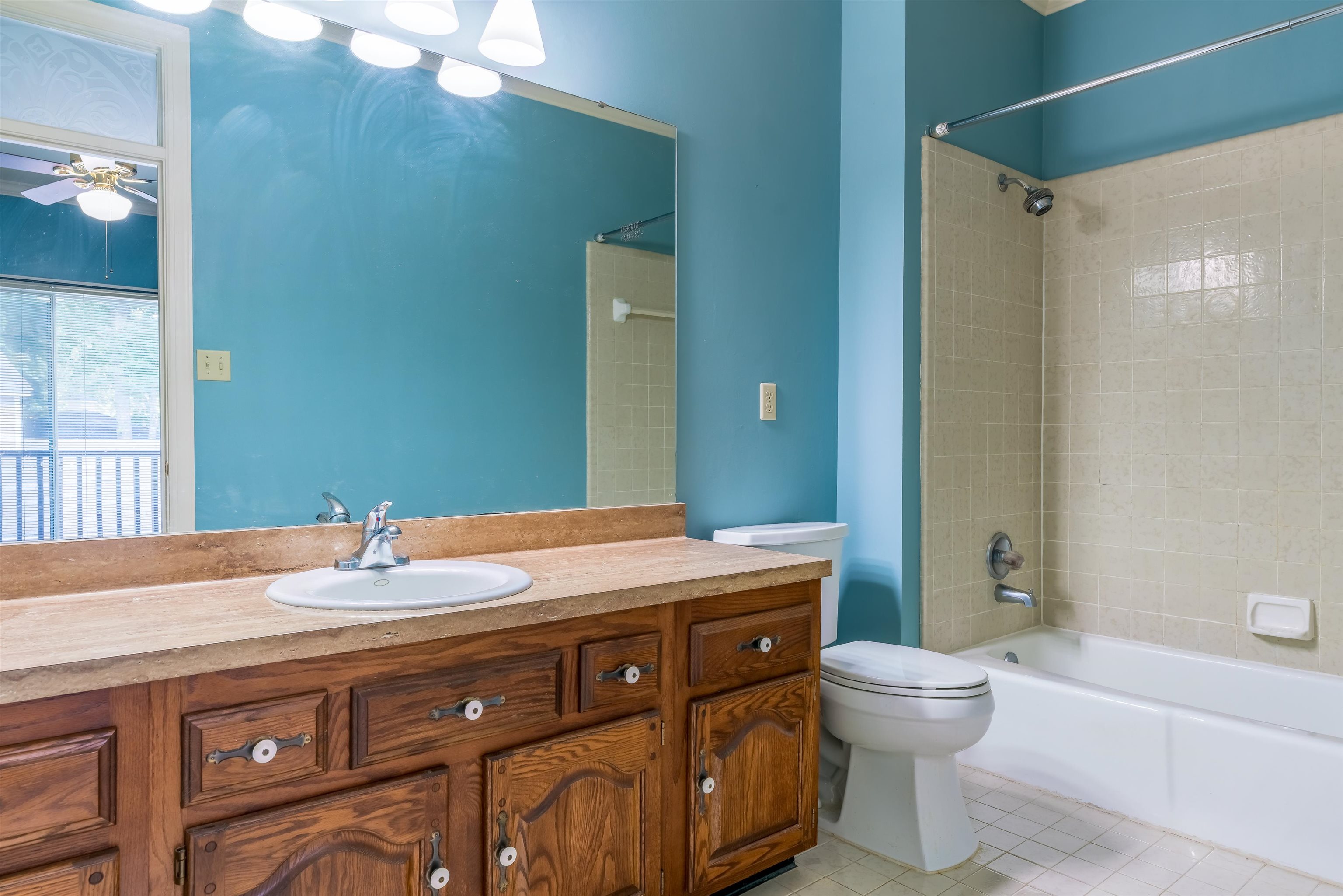 1657 Kimbrough Road, Unit 1657 Germantown, TN 38138 - Photo 20 of 25 a bathroom with a sink toilet and shower