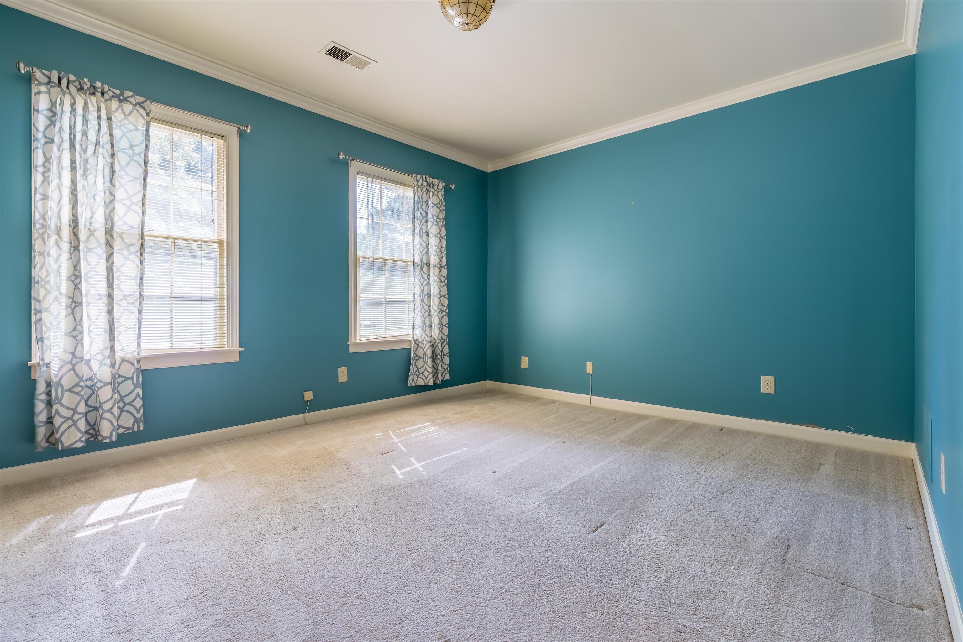 1657 Kimbrough Road, Unit 1657 Germantown, TN 38138 - Photo 21 of 25 a view of an empty room with a window