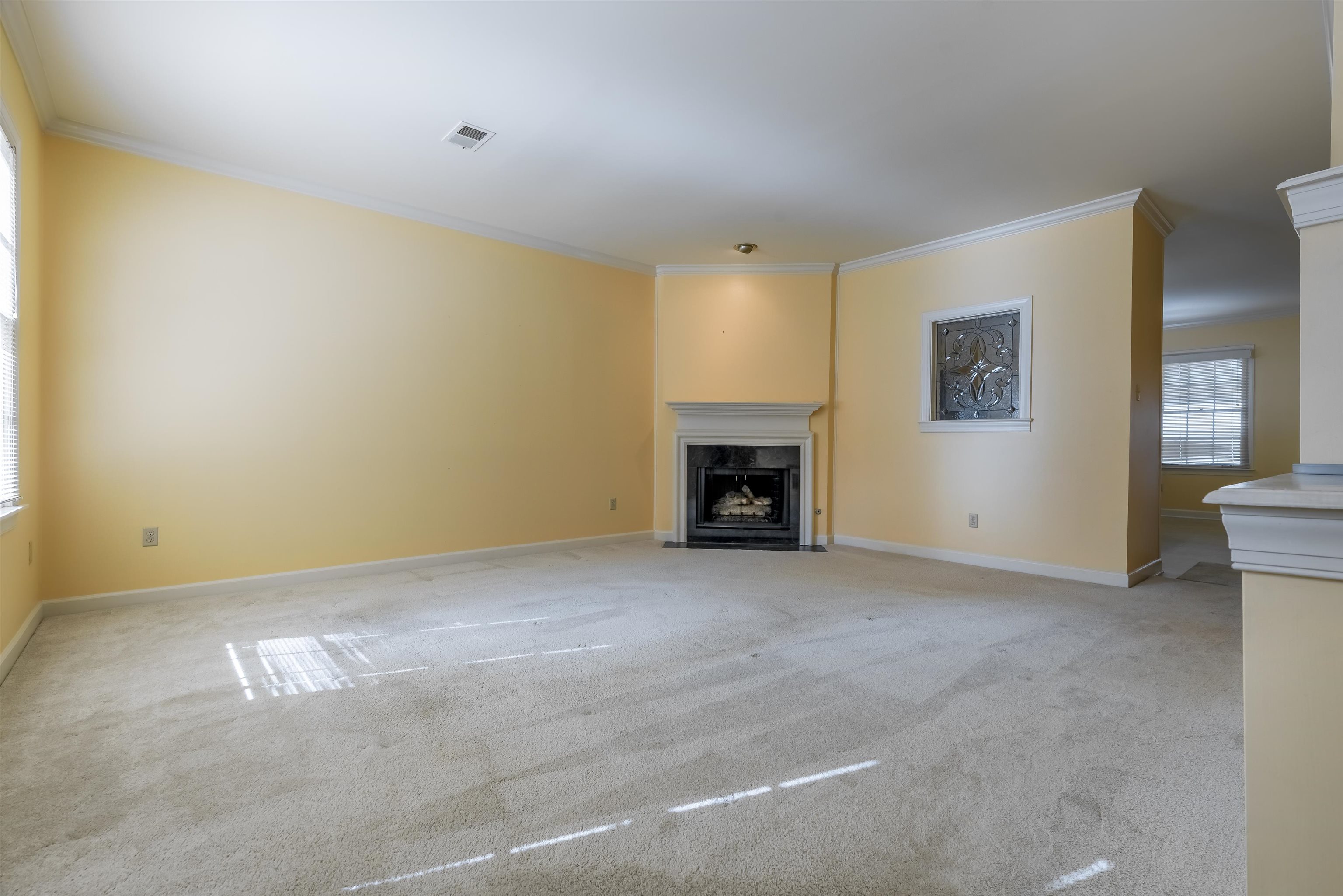 1657 Kimbrough Road, Unit 1657 Germantown, TN 38138 - Photo 5 of 25 a view of an empty room with a fireplace