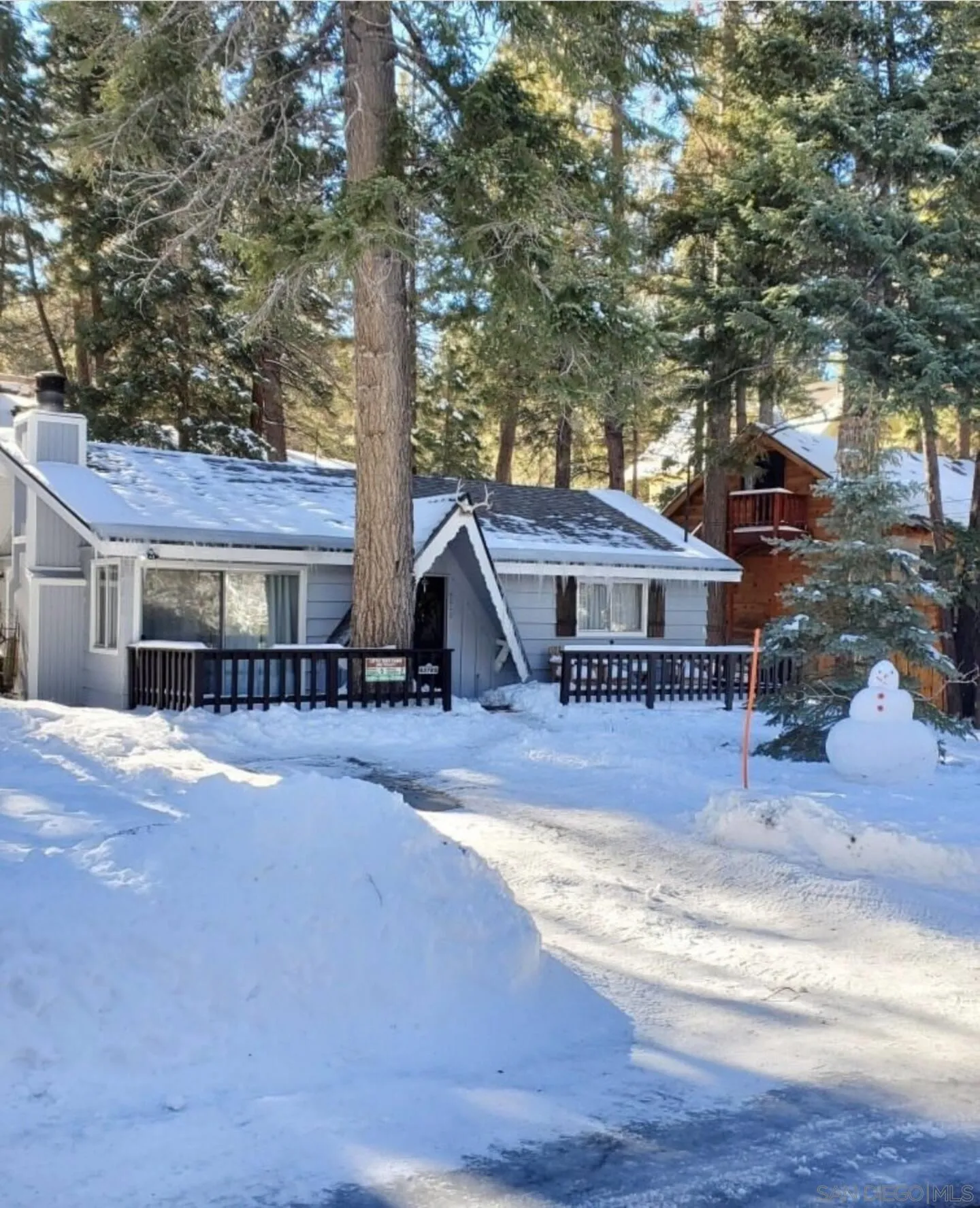 43785 Sand Canyon Road Big Bear Lake, CA 92315 - Photo 4 of 9 a front view of a house with a yard