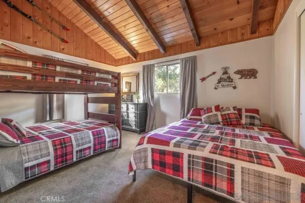 a bathroom with a sink a mirror and a bathtub