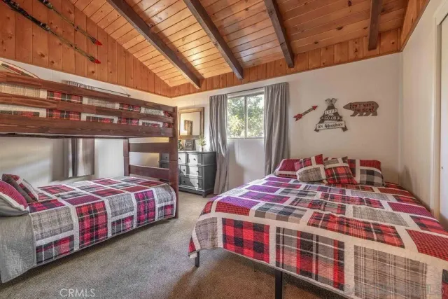 a bathroom with a sink a mirror and a bathtub