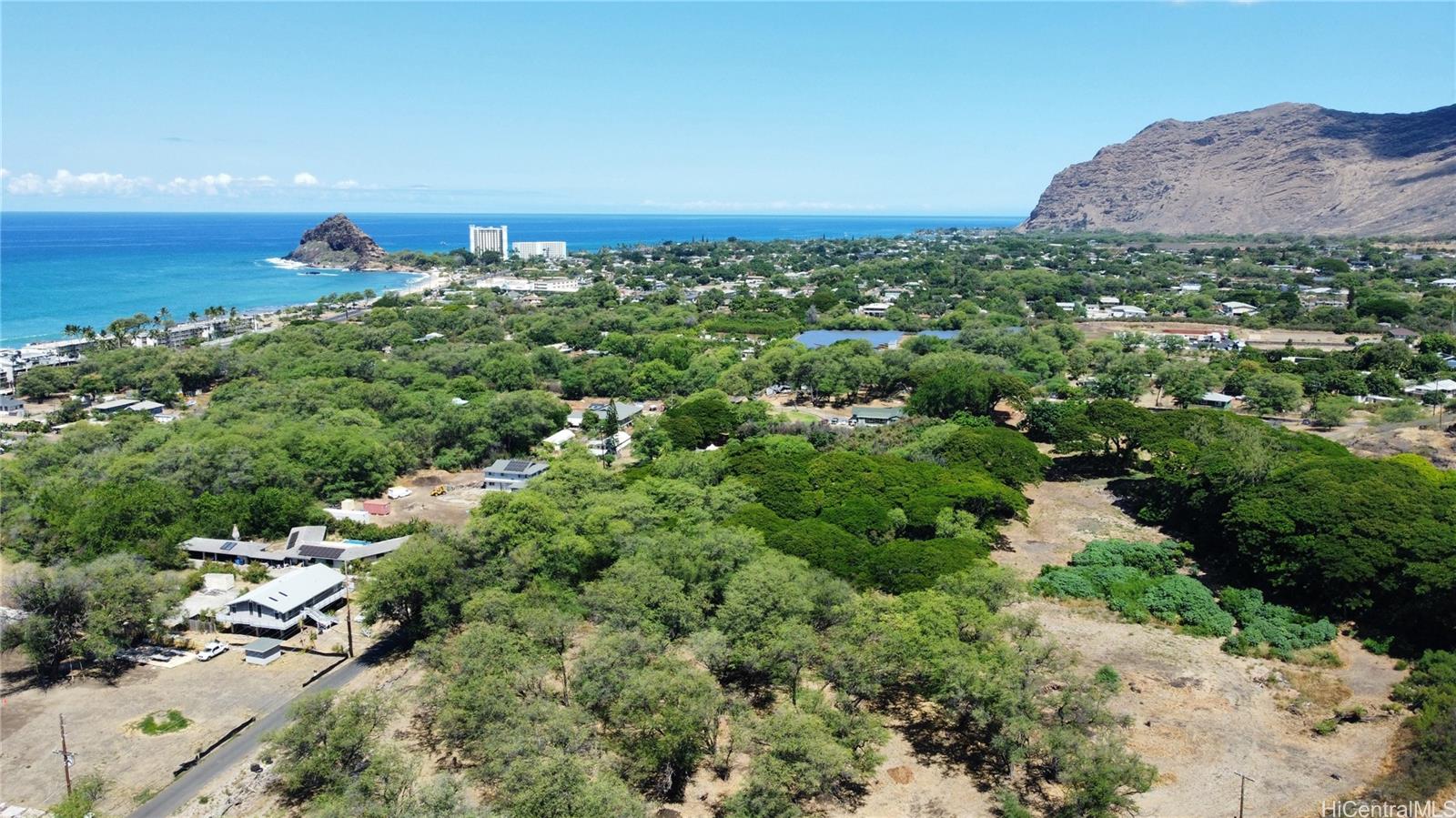 85-230 Mahinaau Road Waianae, HI 96792 - Photo 3 of 7 an aerial view of a houses with a yard