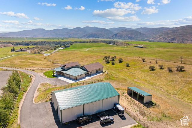 6117 North Rocky Ridge Road Peoa, UT 84061 - Photo 70 of 83 Bird's eye view with a rural view and a mountain view