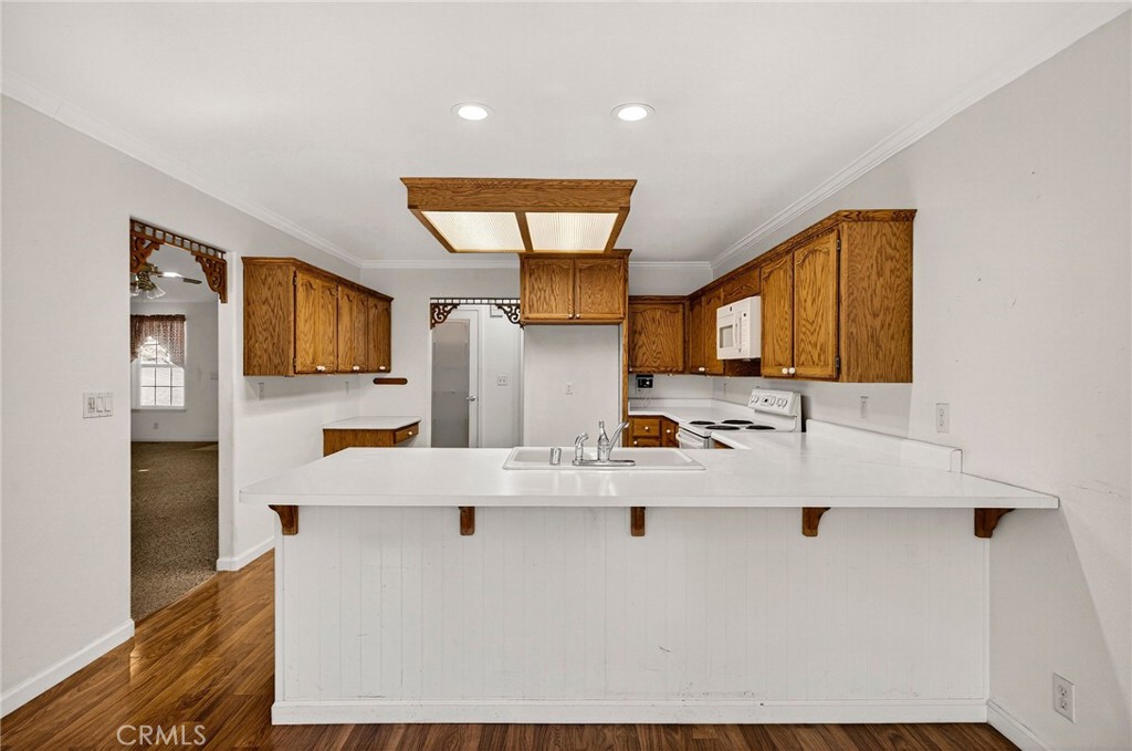 10202 Cohasset Road Chico, CA 95973 - Photo 17 of 75 a view of kitchen with stainless steel appliances sink refrigerator and stove
