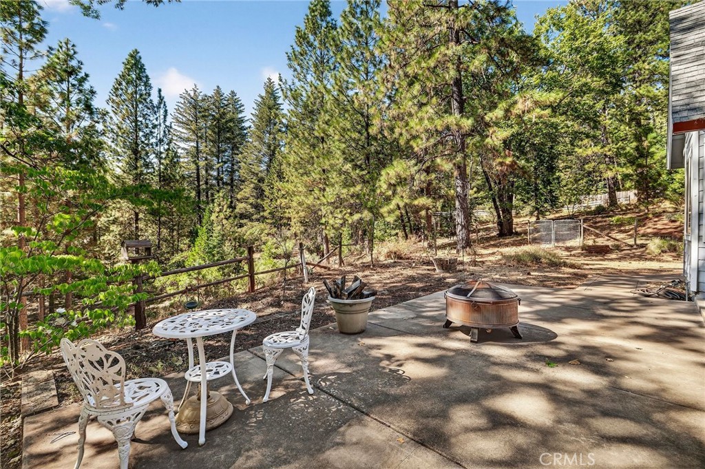 10202 Cohasset Road Chico, CA 95973 - Photo 52 of 75 a backyard of a house with table and chairs