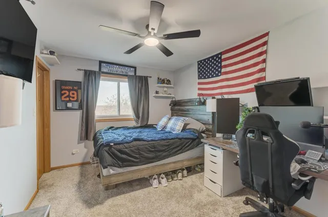 a bedroom with a bed and furniture