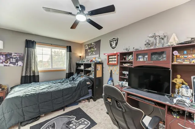 a bedroom with a bed and furniture