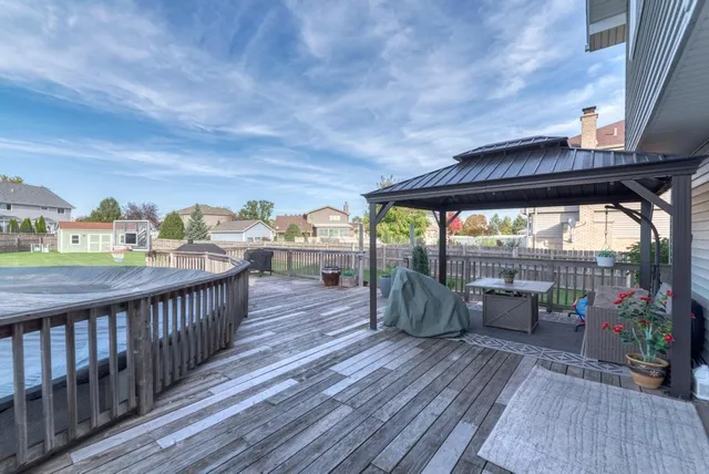 a view of roof deck with patio
