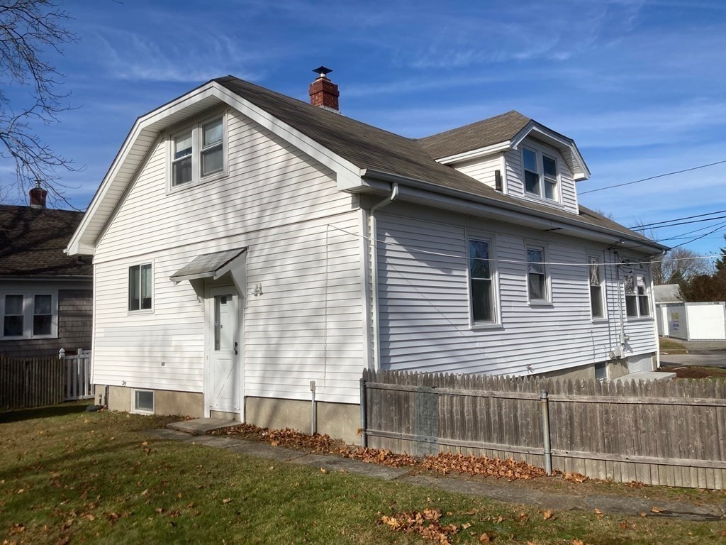 33 Circuit Drive Riverside, RI 02915 - Photo 3 of 34 a front view of a house with a yard